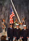 Click on the Thomas E. Franklin photo archive of the three FDNY firefighters raising the American flag for a larger image.