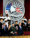 Click on the October 11, 2001 photo of President George W. Bush at the Pentagon for a larger image.