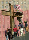 A cross of steel beams left standing after the 9-11 WTC towers collapse. Click on the image for a larger image.