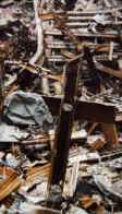 September 11 News.com - Heavenly crosses, and mysterious images, faces, and creatures in the smoke of the World Trade Center towers after the terrorist attacks in New York City on 9-11-2001.