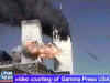 A mysterious flying object near the WTC Tower captured on videotape. Click on the photo for a large image.