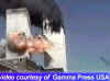 A mysterious flying object near the WTC Tower captured on videotape. Click on the photo for a large image.