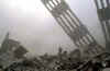 NYC Image © AP. In the aftermath of the September 11, 2001 terrorist attacks on the World Trade Center in New York City, firemen and rescue workers search for survivors, and extenguish flames in the massive rubble from the 09-11-2001 attack.