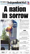 Click on the USA newspaper front page headlines and covers pictures for a larger newspaper cover image from the week of September 11, 2001.