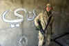 Click on the December 20th photo of a U.S. Marine in Kandahar for a larger image.