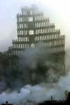 Thirty days after the collapse of the World Trade Center twin towers smoke continues to rise from the debris.