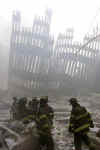 NYC Image  Reuters. In the aftermath of the September 11, 2001 terrorist attacks on the World Trade Center in New York City, firemen and rescue workers search for survivors, and extenguish flames in the massive rubble from the 09-11-2001 attack.